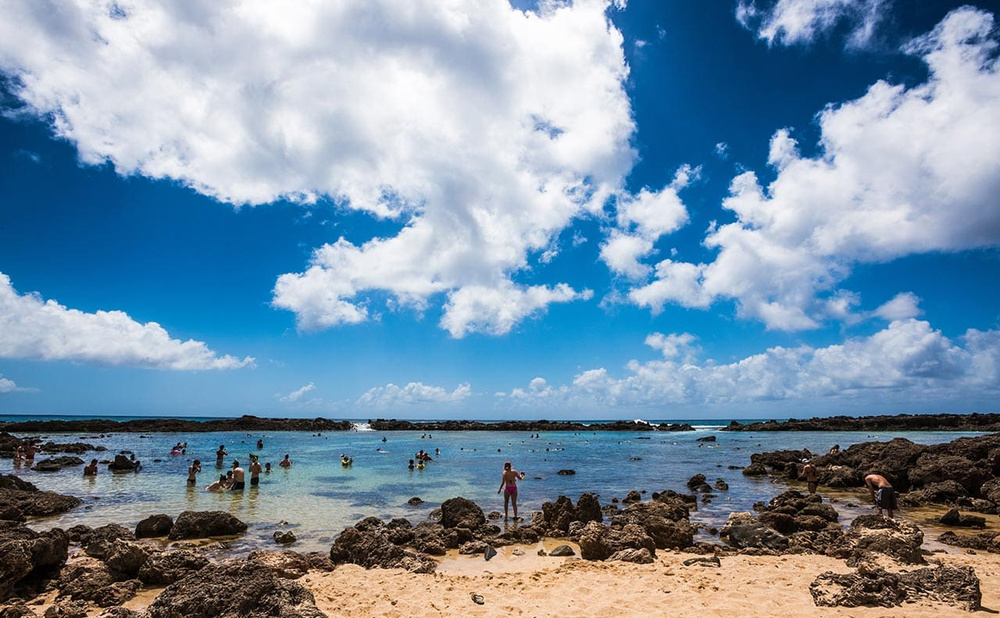 Pupukea Beach - A Safe Oahu Snorkeling Spot Surrounded by Natural Rocks